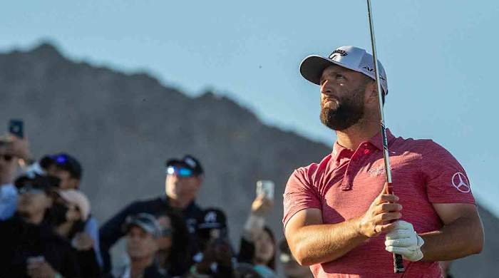 Jon Rahm watches a shot in the final round of the 2023 American Express.